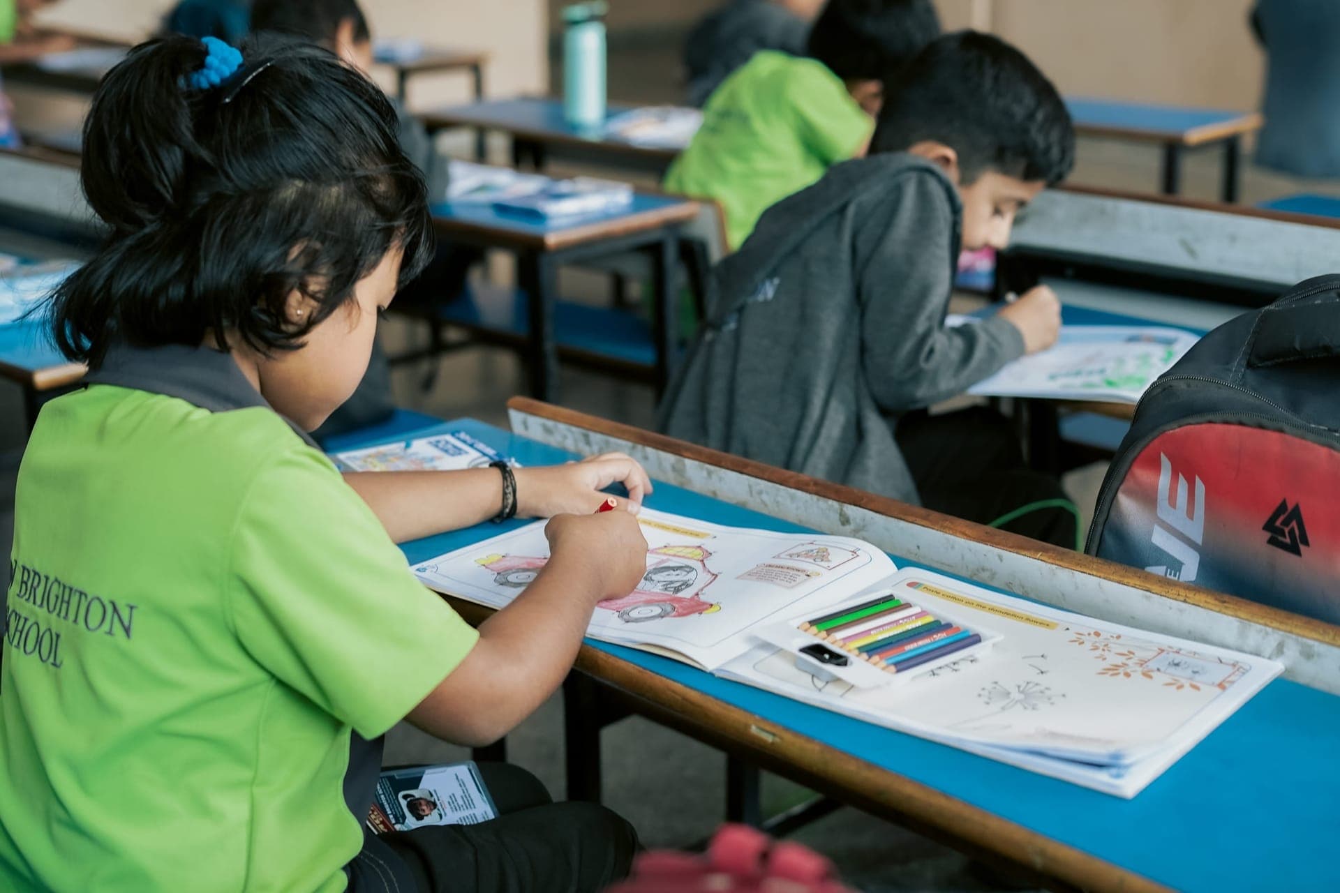 A student at work during an inter-school art competition