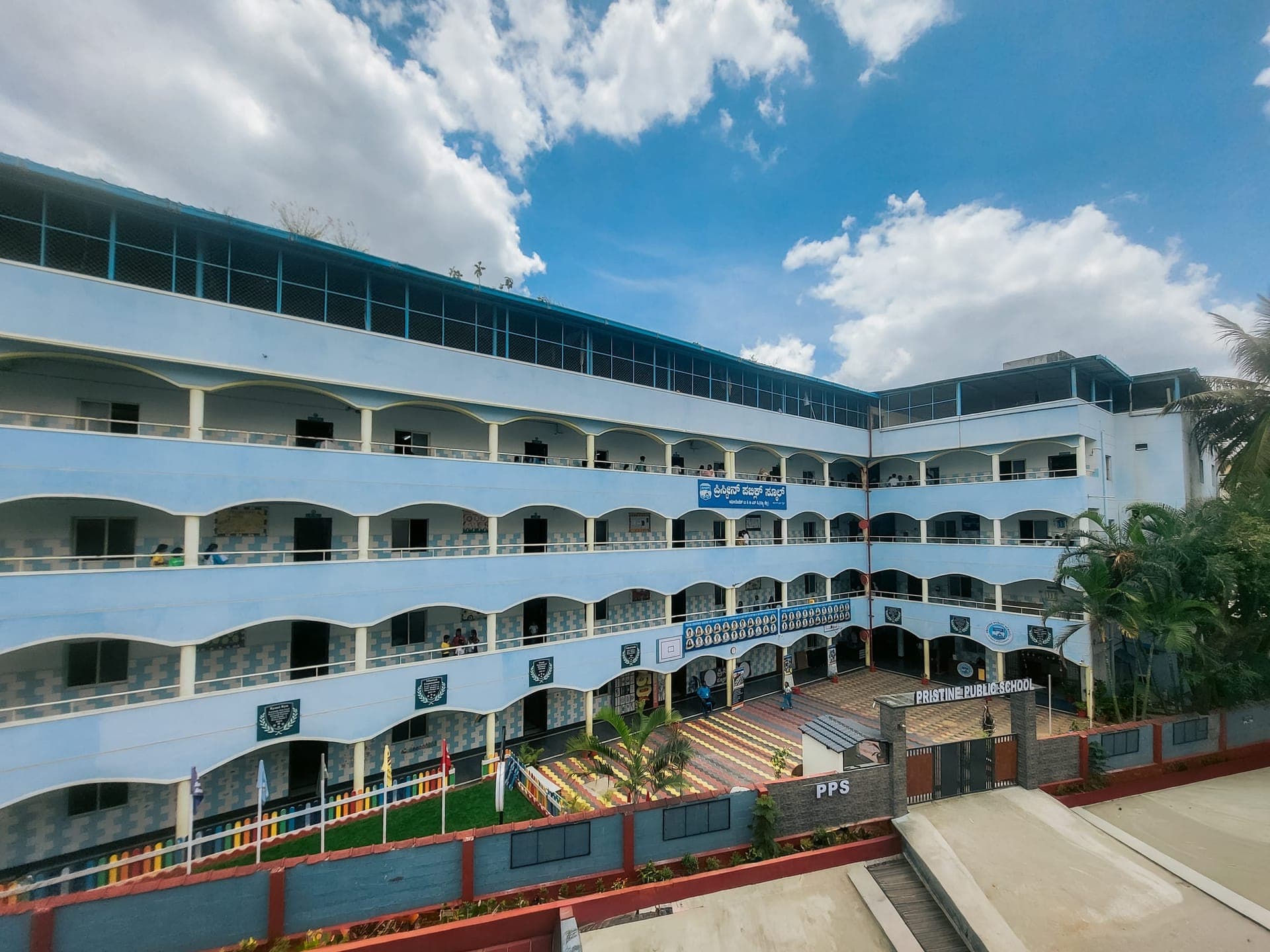 Students and teachers on the Pristine Public School campus